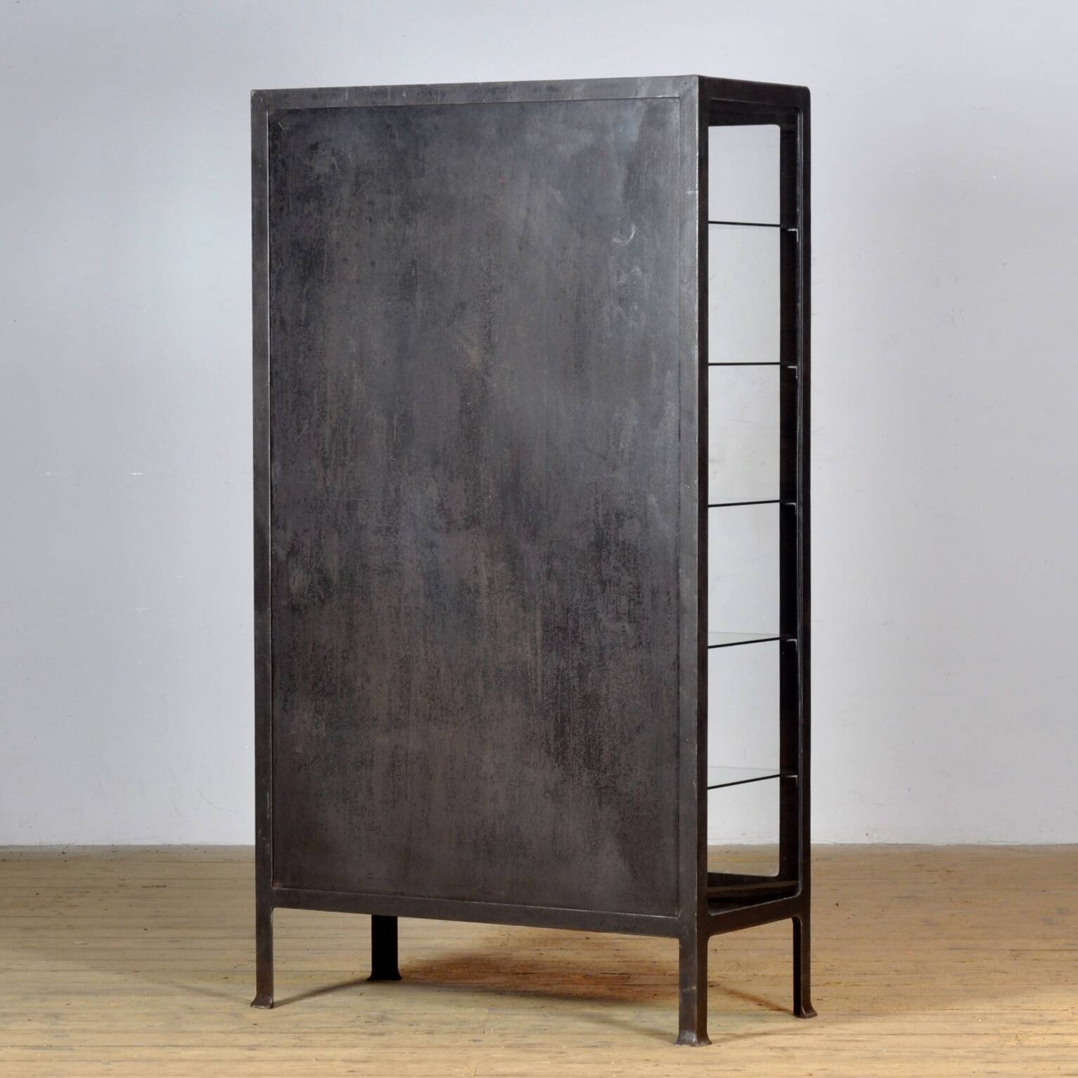 Polished iron medical cabinet, 1930s