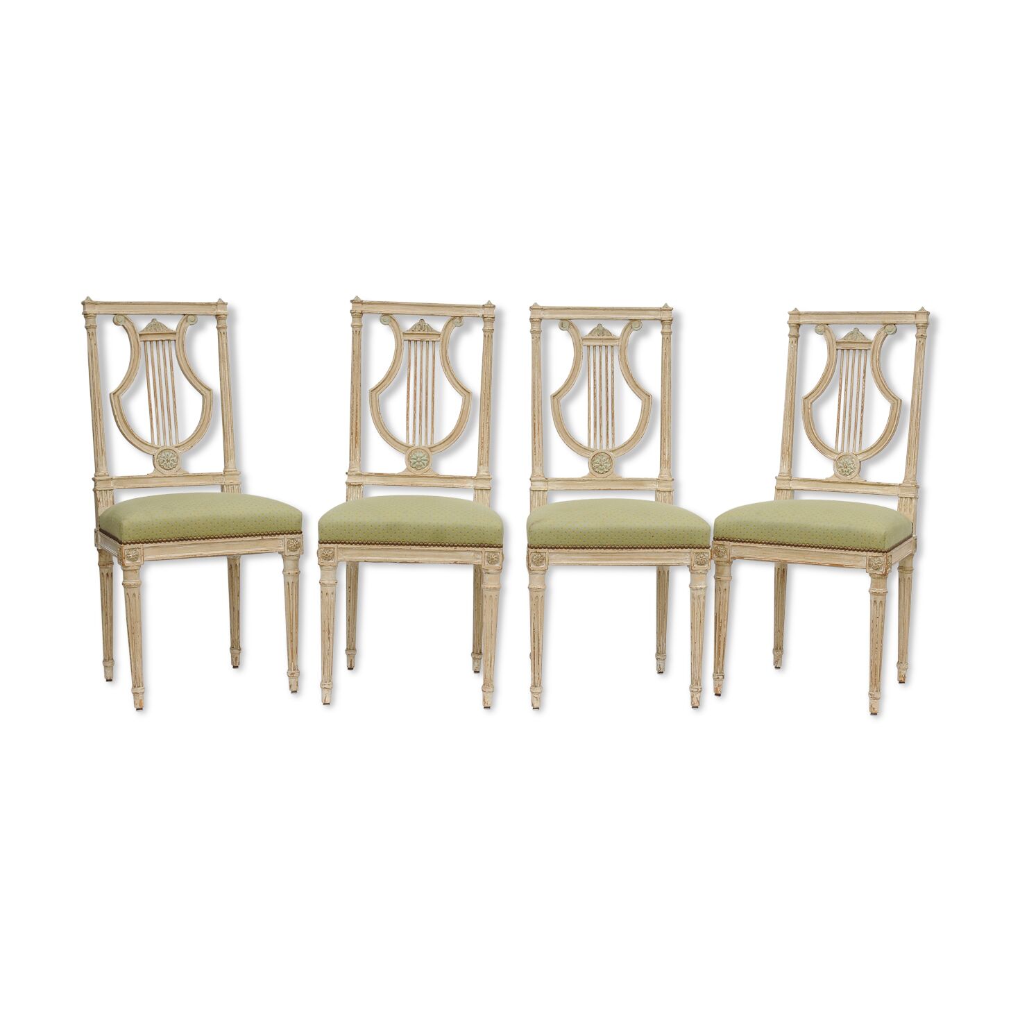 Série de 4 chaises à dossier lyre