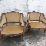 Pair of armchairs basket louis XV in carved walnut