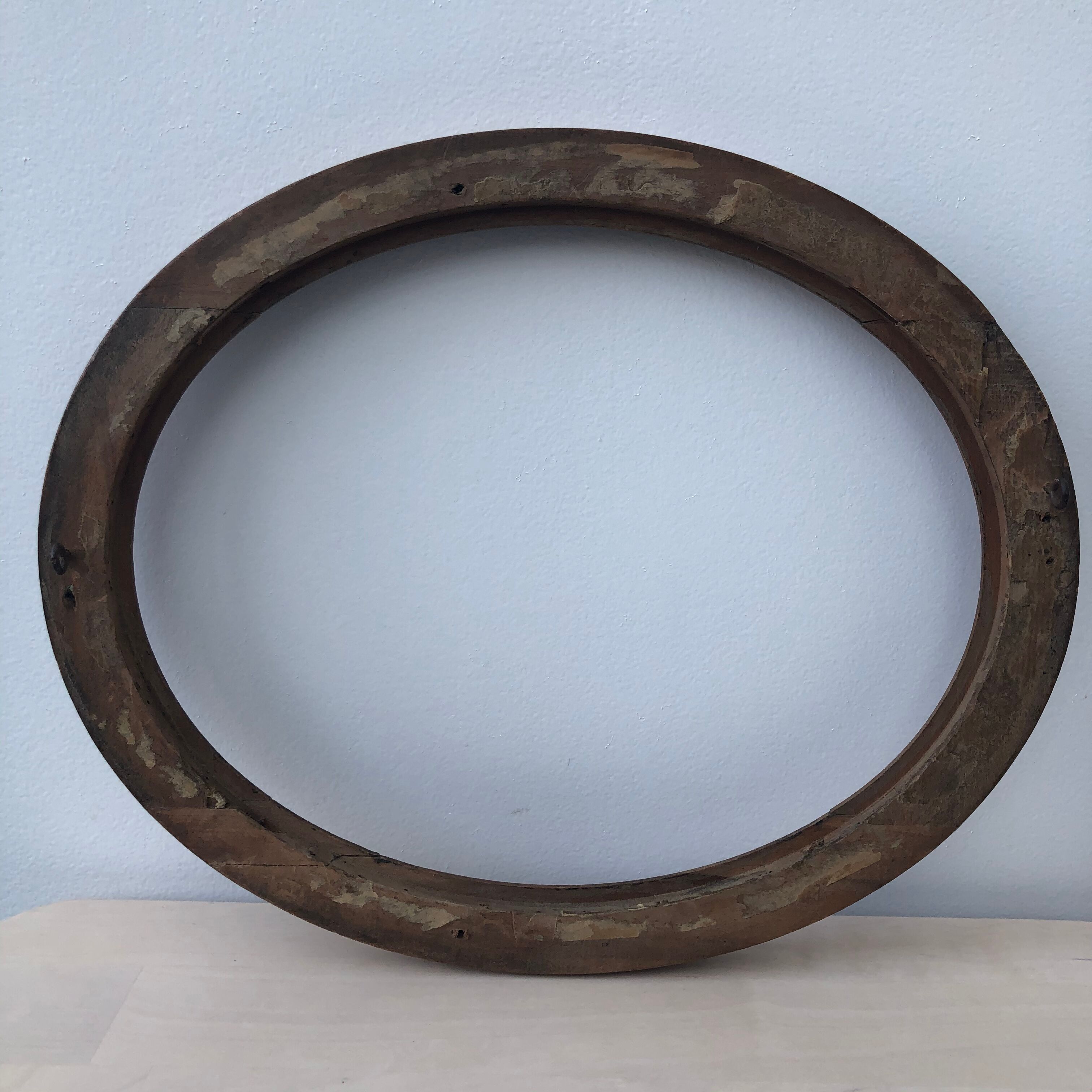 Wooden oval frame