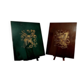 Two panels in lacquer and gold by Pierre Bobot.