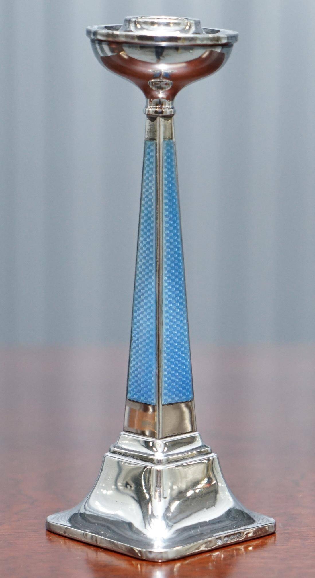 Pair of sterling silver and enamel candlesticks 1927 by Charles Green & Co.