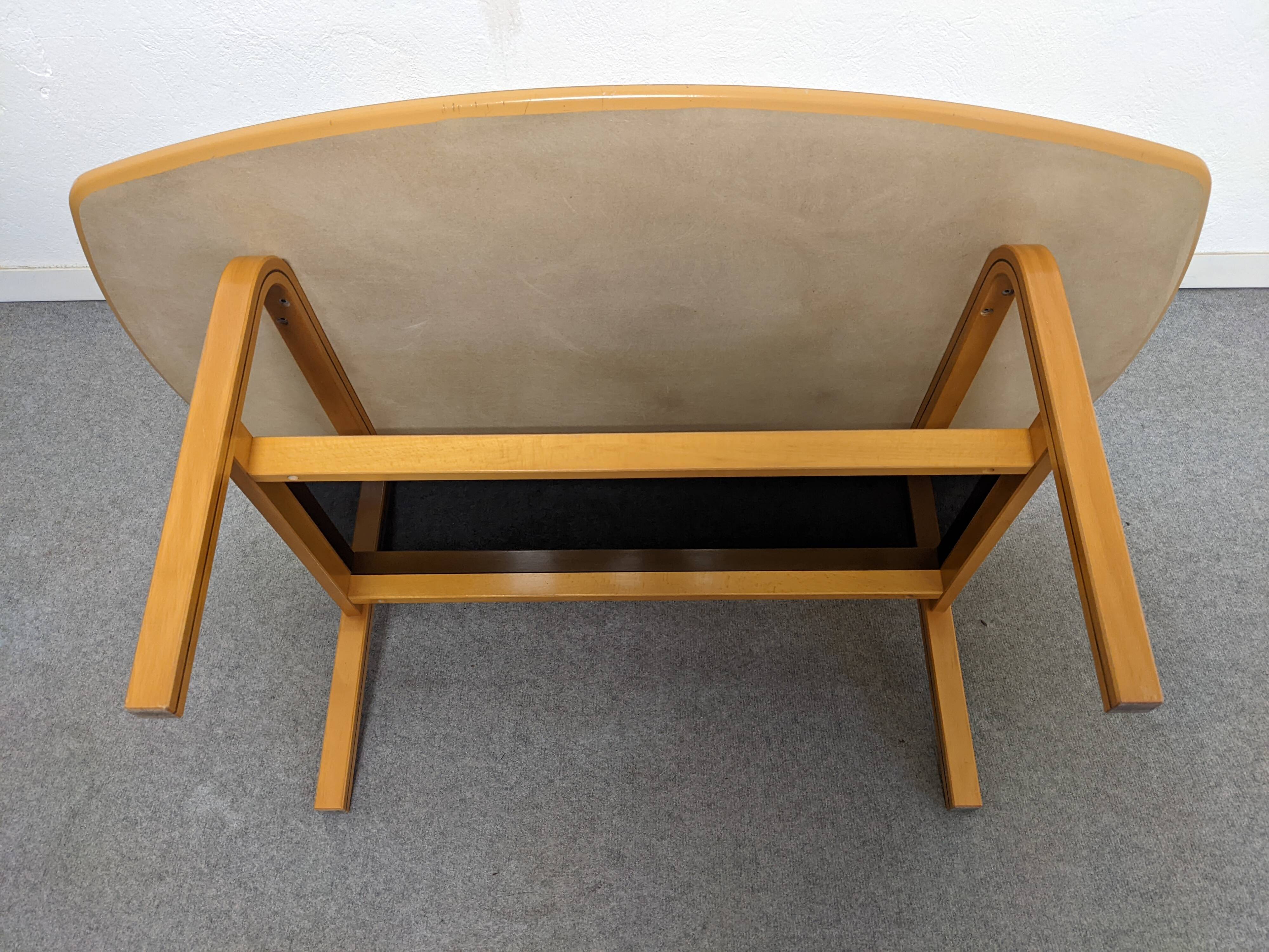 Table basse bow wood des années 60/70