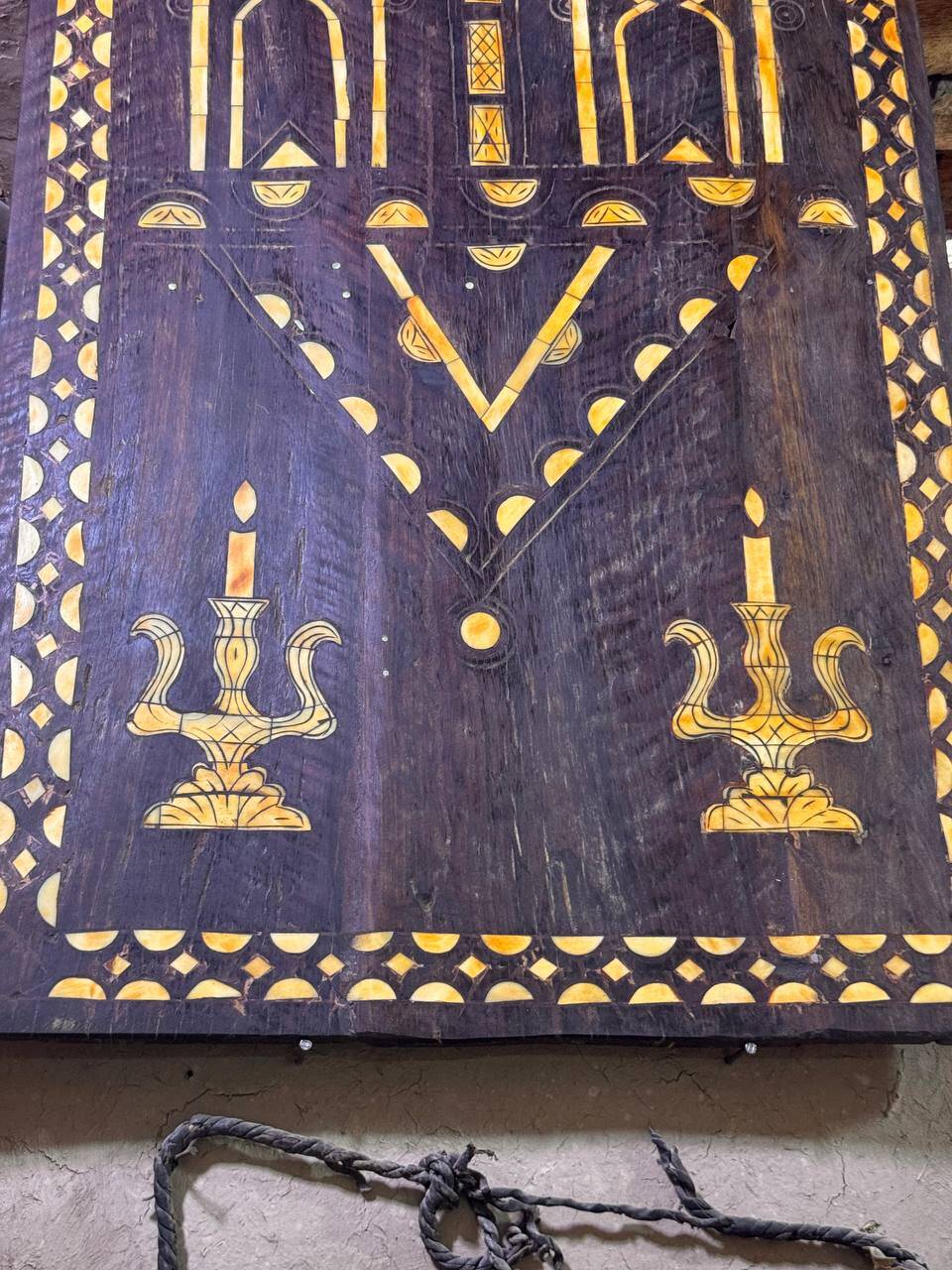 Berber heritage: ancient door decorated with camel bones