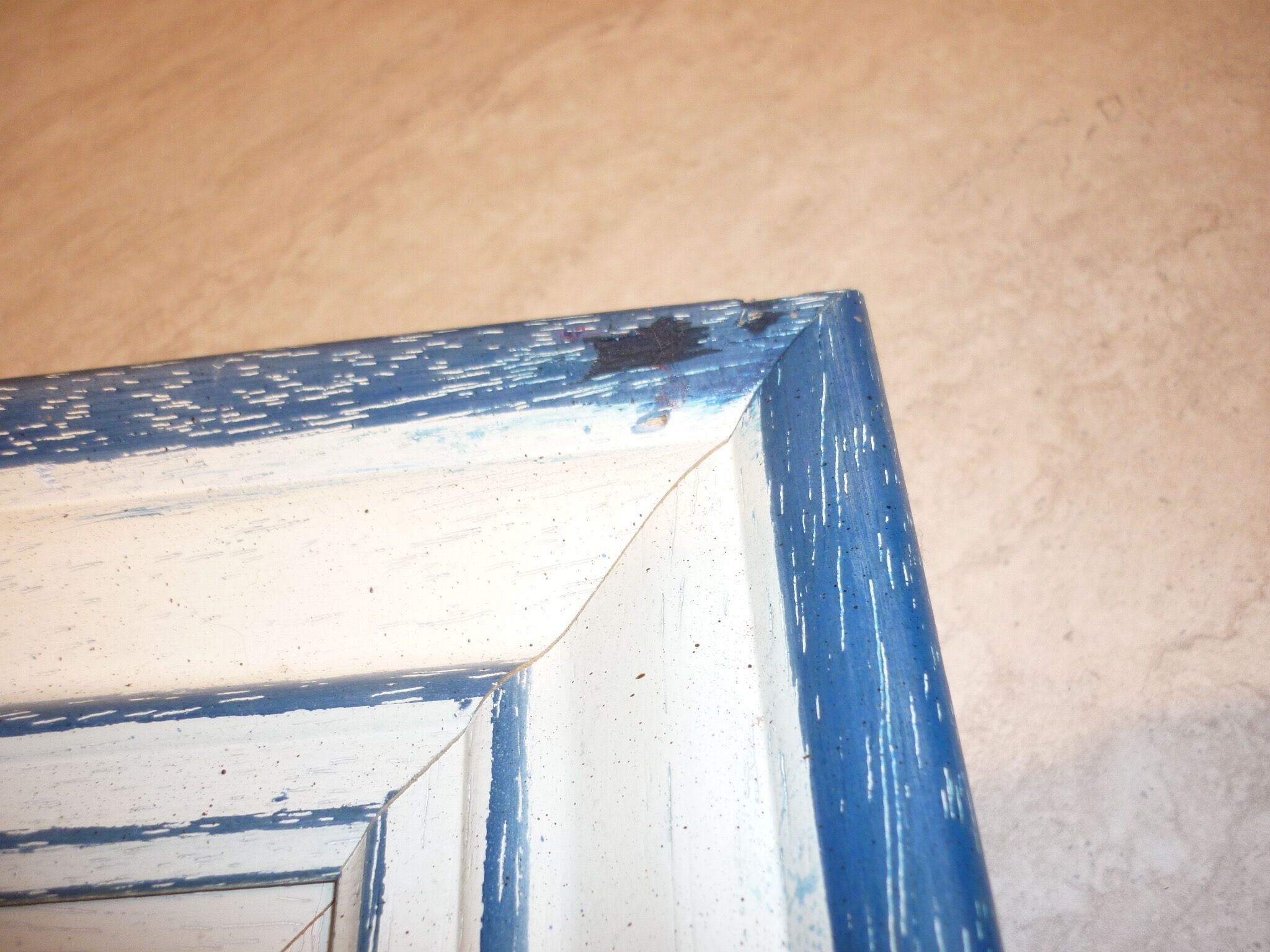 Oil on canvas of a boat on the foreshore signed Yann 55X45