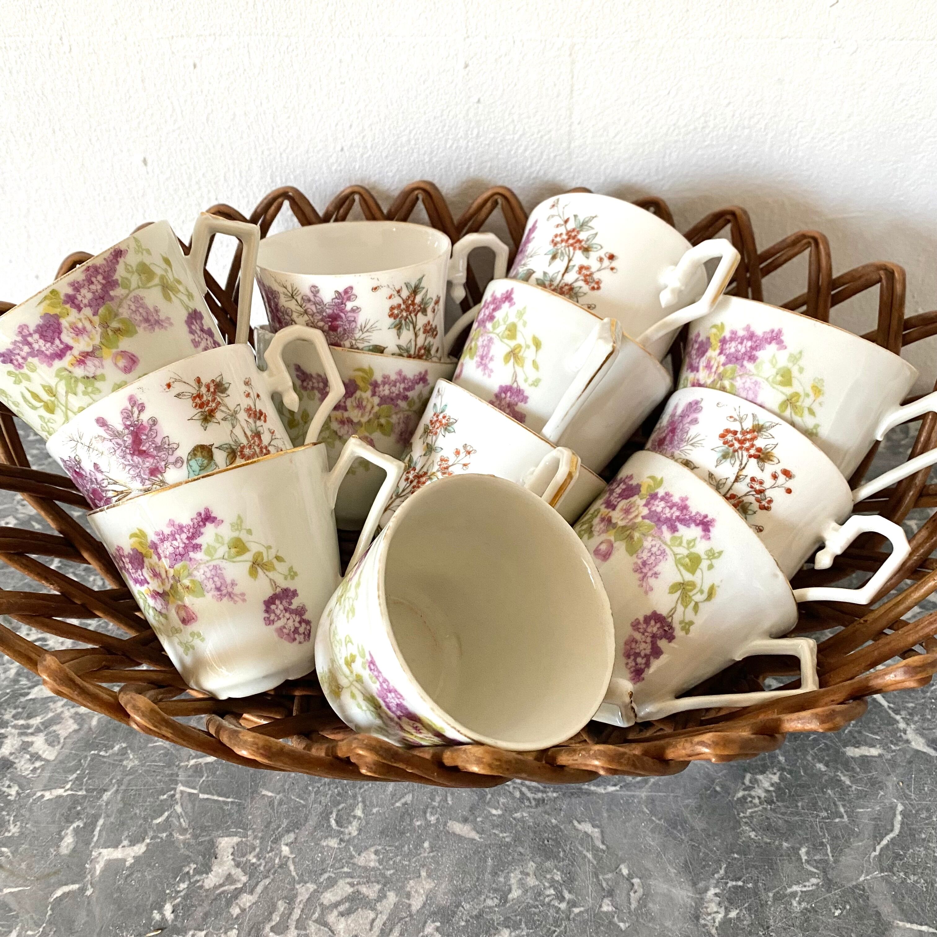 Antique flowered porcelain cups mismatched