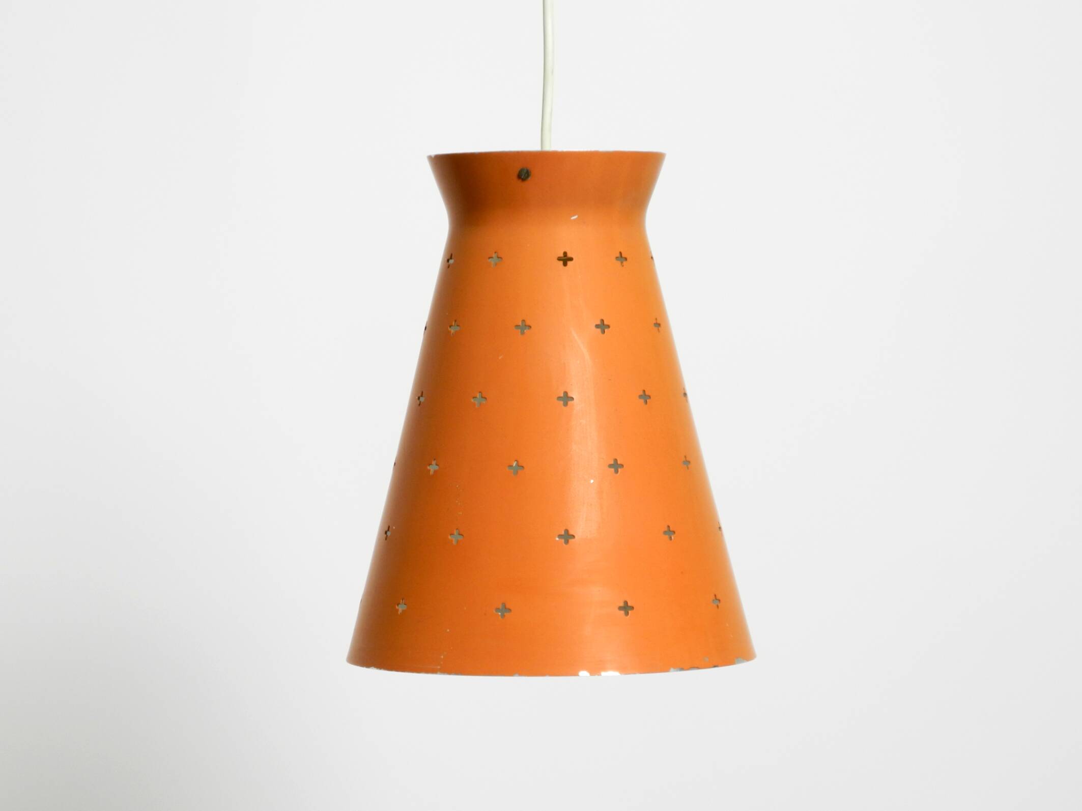 Beautiful Mid Century Modern Diabolo perforated metal sheet pendant lamp