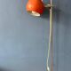 Mid-Century orange floor lamp with "eyeball" shade