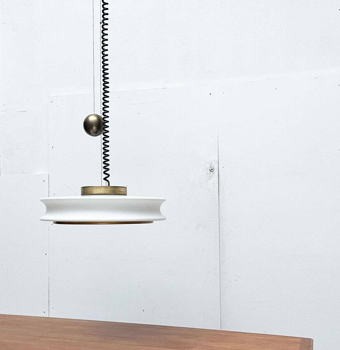 Orion counterweight pendant lamp in mid-century modern German space style, made of Staff Leuchten glass, 1960s.