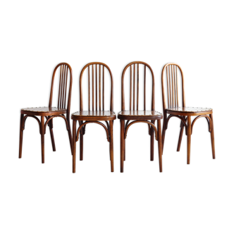 Suite de 4 chaises bistrot Luterma en bois courbé et simili cuir, début XX ème