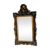 Antique bevelled mirror from the 19th century, sculpted and gilded frame.