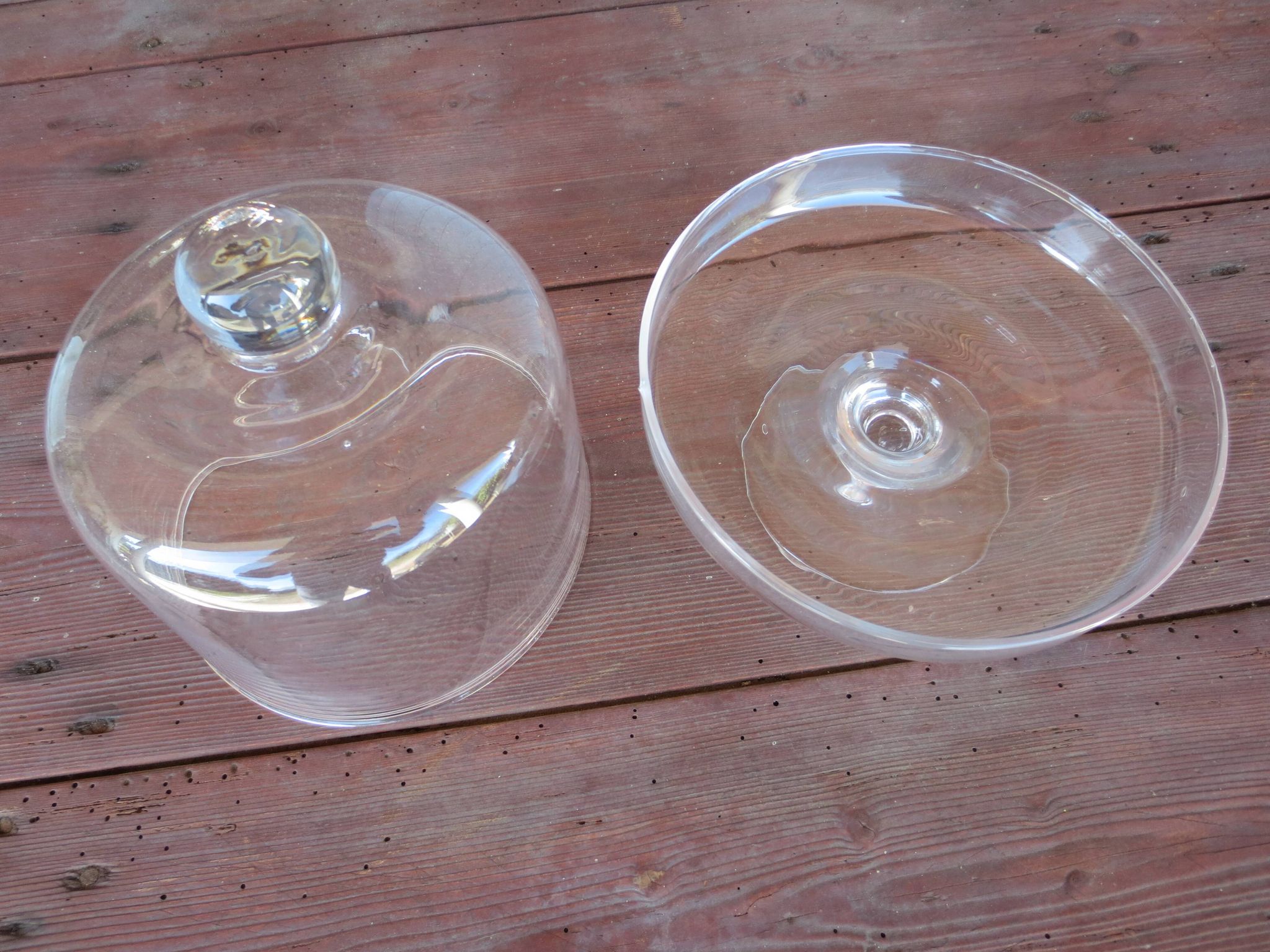 Old glass cake dome on a stand