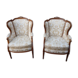 Pair of Louis XVI style armchairs with ears