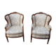 Paire de fauteuils de style Louis XVI à oreilles