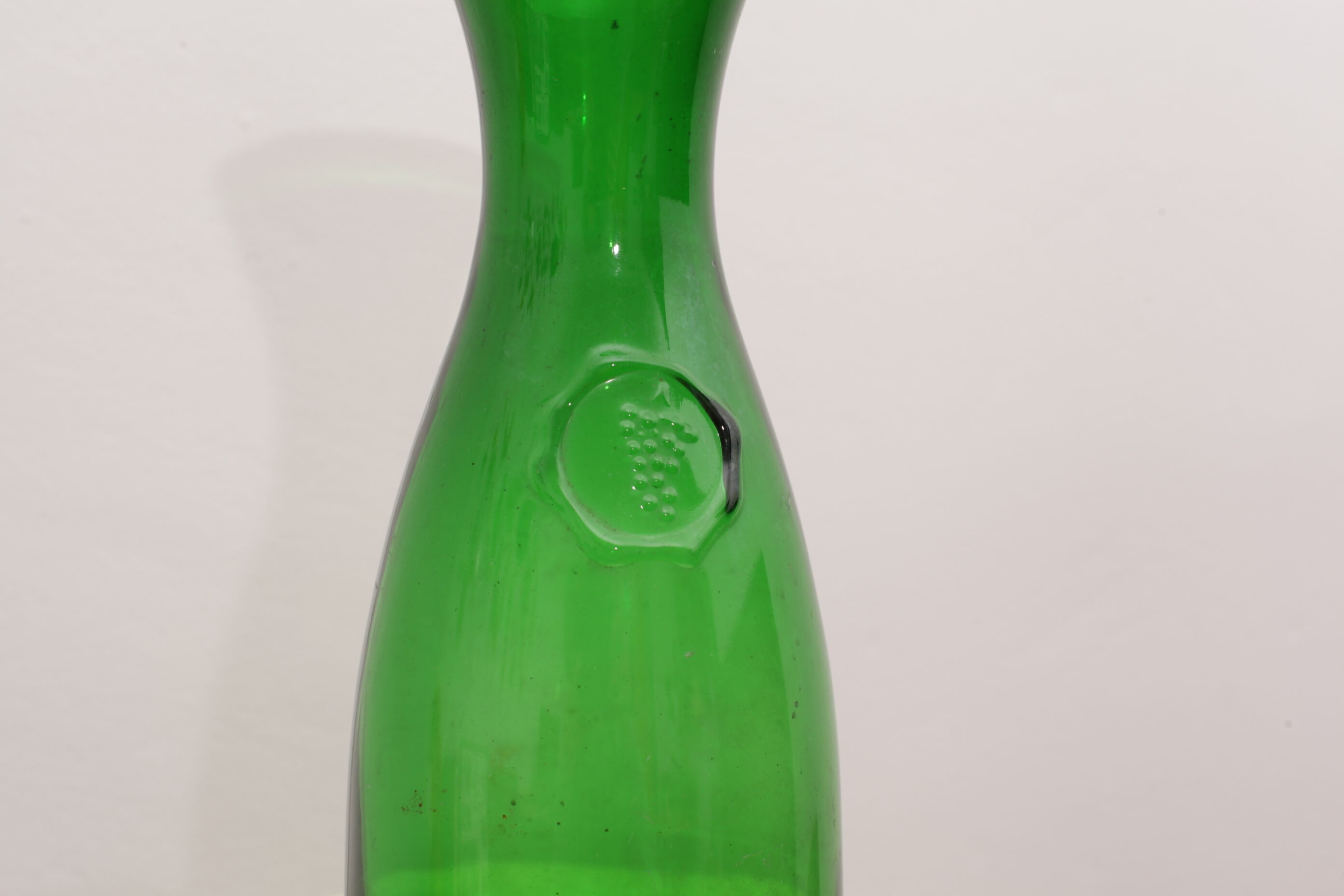 Glass carafe or vase with medallion