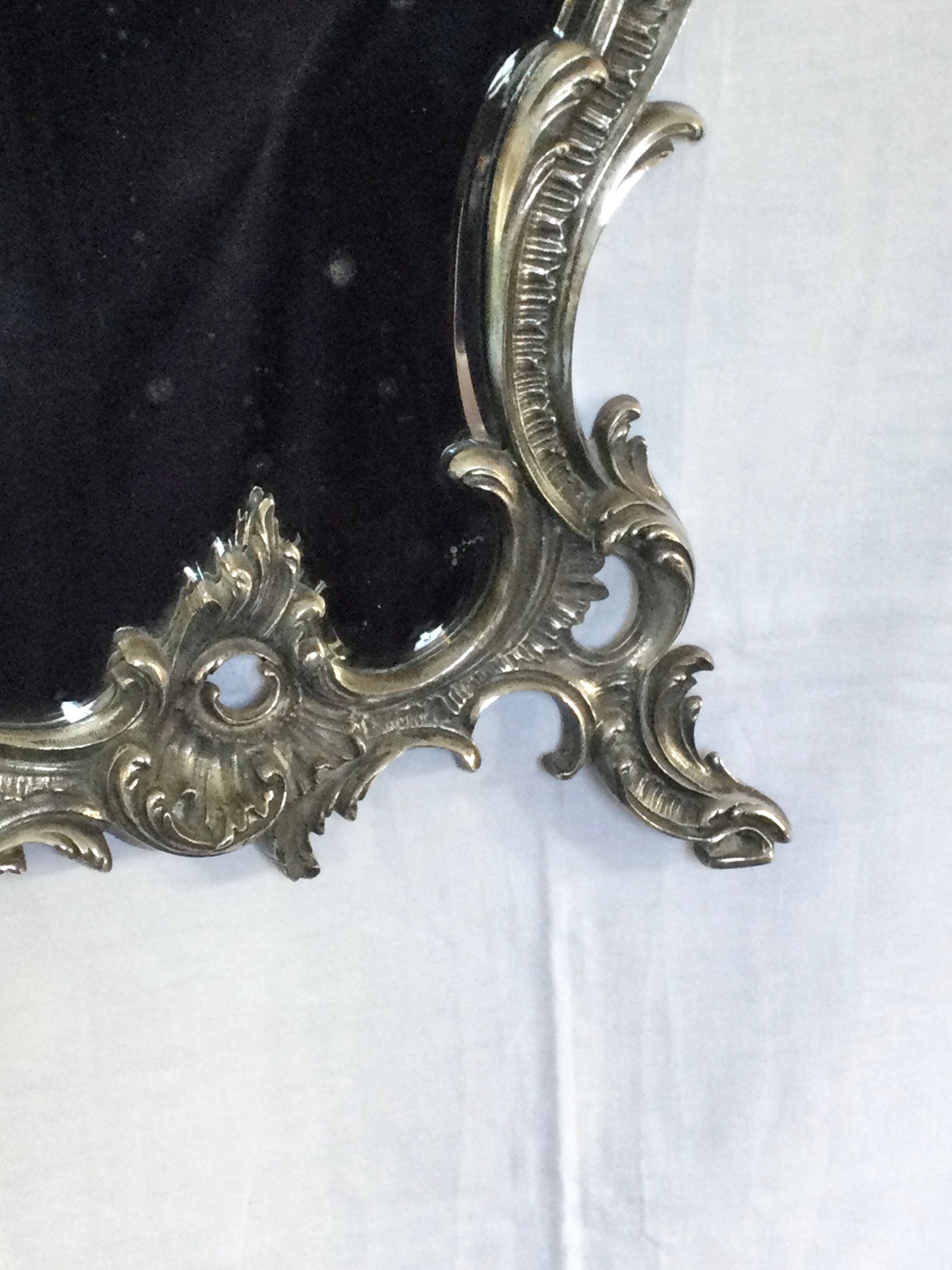 Nineteenth century mirror in silver bronze