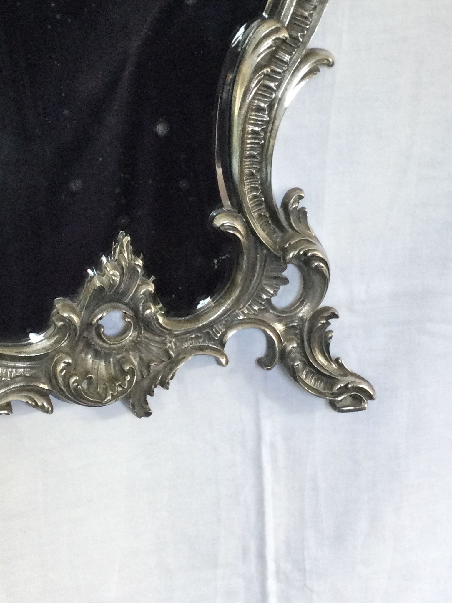 Nineteenth century mirror in silver bronze