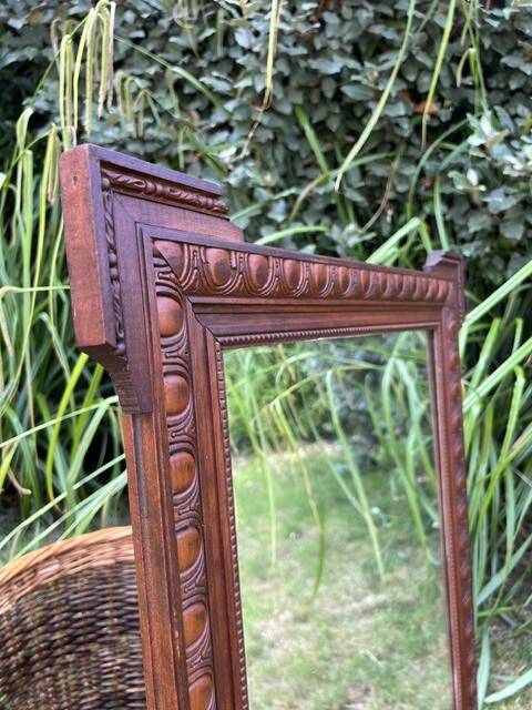 Antique carved wooden mirror
