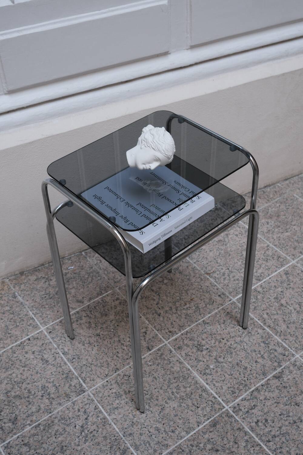 Vintage side table in smoked glass and chromed metal – 70s