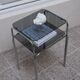 Vintage side table in smoked glass and chromed metal – 70s