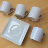 4 coffee cups and saucers