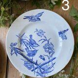 Plate decorated with blue birds and butterflies