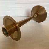 Asymmetrical brass candle holder