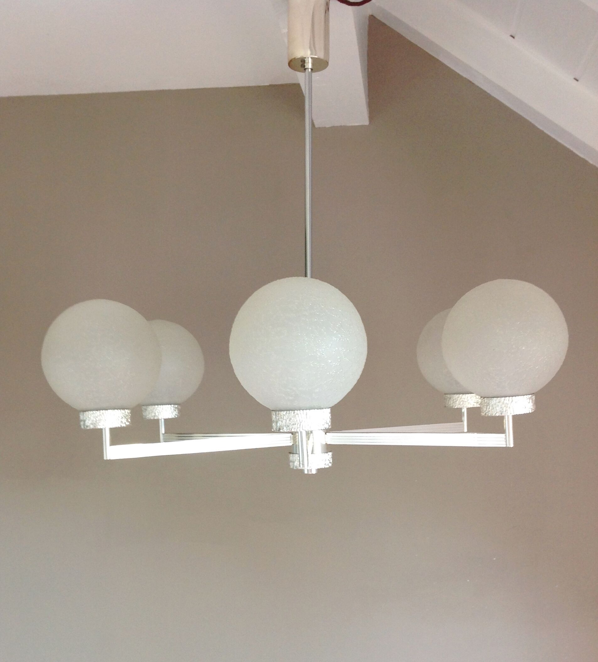 Six-light chrome metal chandelier and opaque glass globes / vintage 60s and 70s