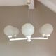 Six-light chrome metal chandelier and opaque glass globes / vintage 60s and 70s