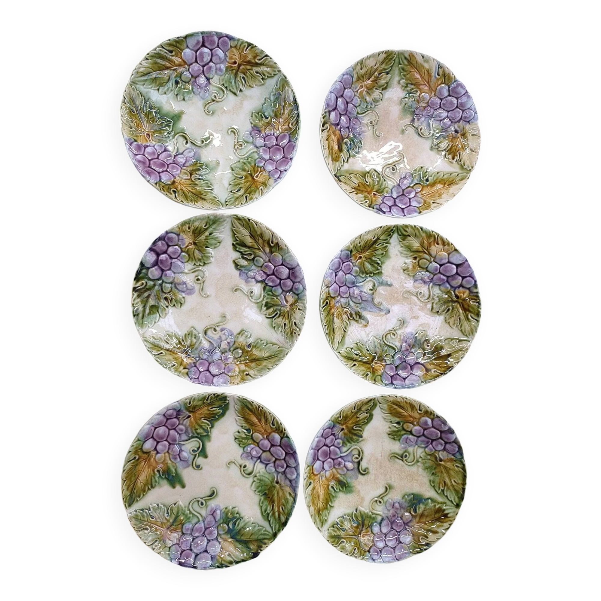 Slipware plates with vine decoration.