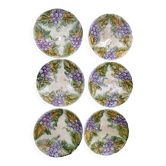 Slipware plates with vine decoration.