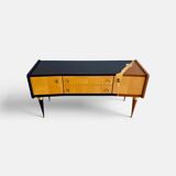 Vintage furniture revamped in navy blue, terracotta, and gold leaf – Reimagined mid-century style.
