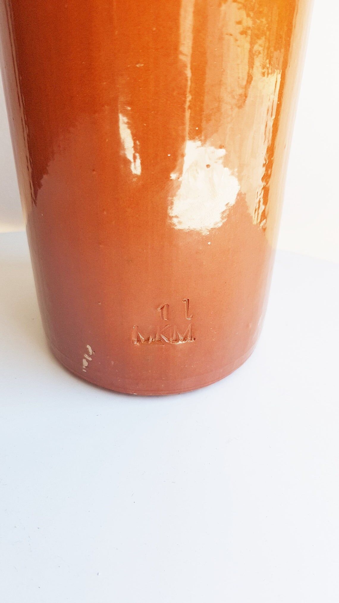 Enamelled sandstone bottle