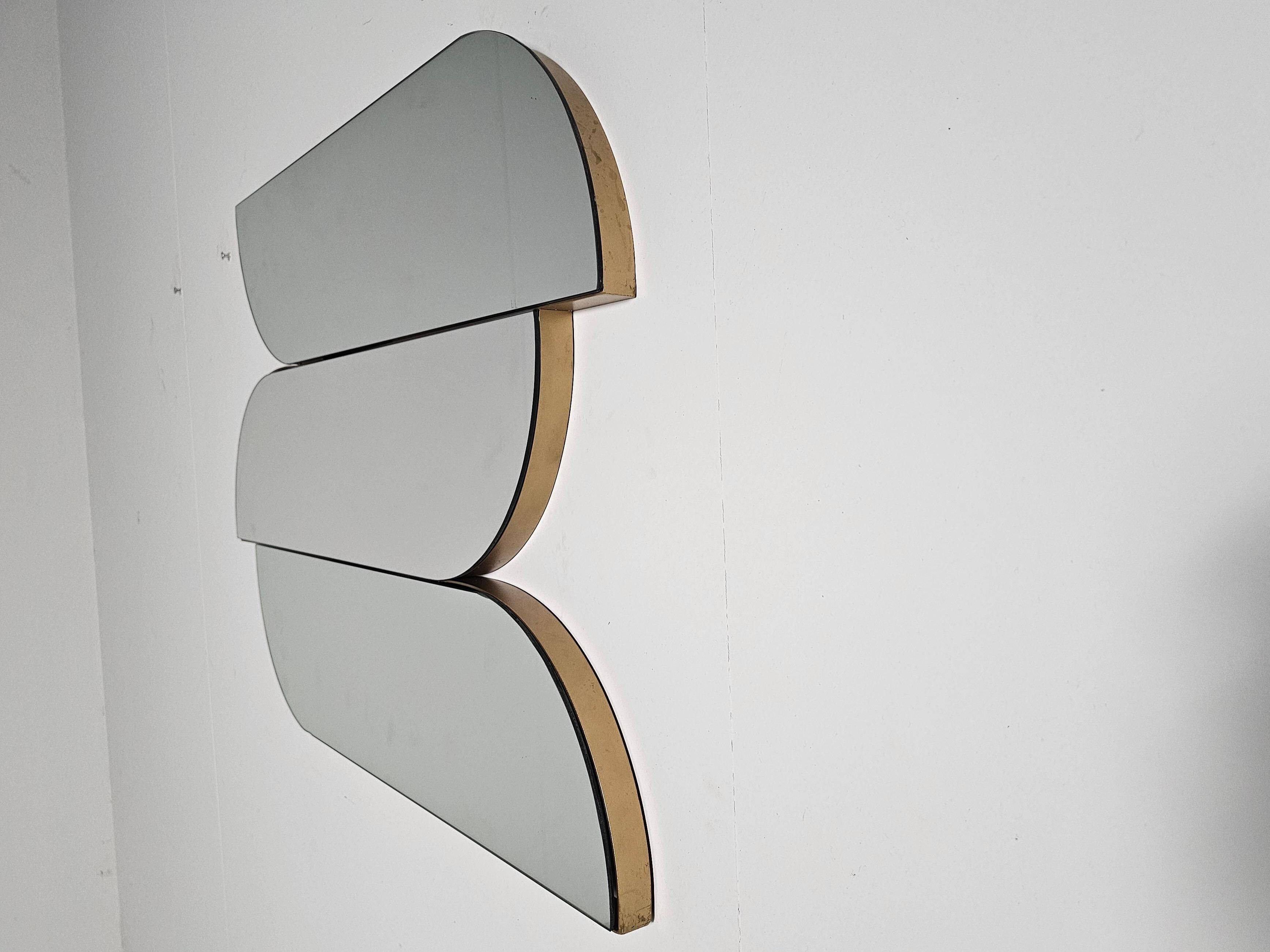 Sculptural wall mirror with brass edges, Italy, 1970s