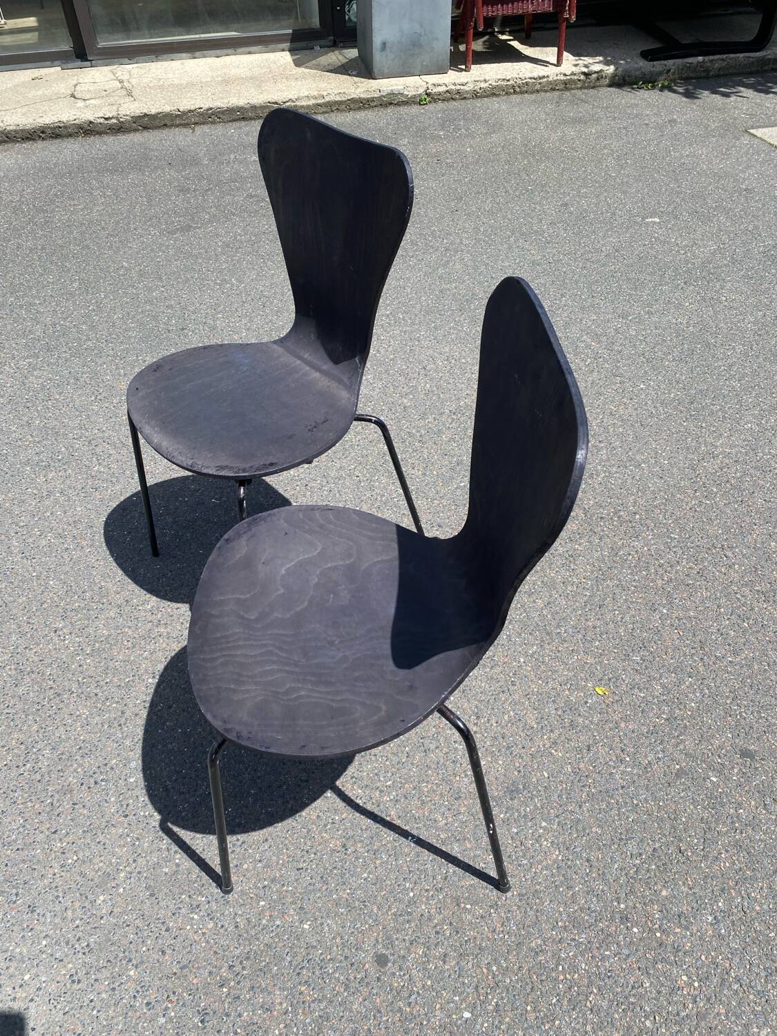 Pairs of wooden chairs