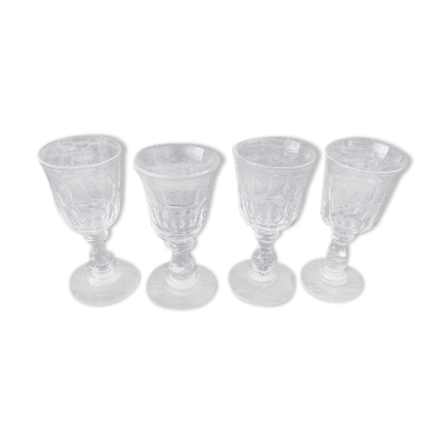 Set of 4 glasses with old feet for liquor