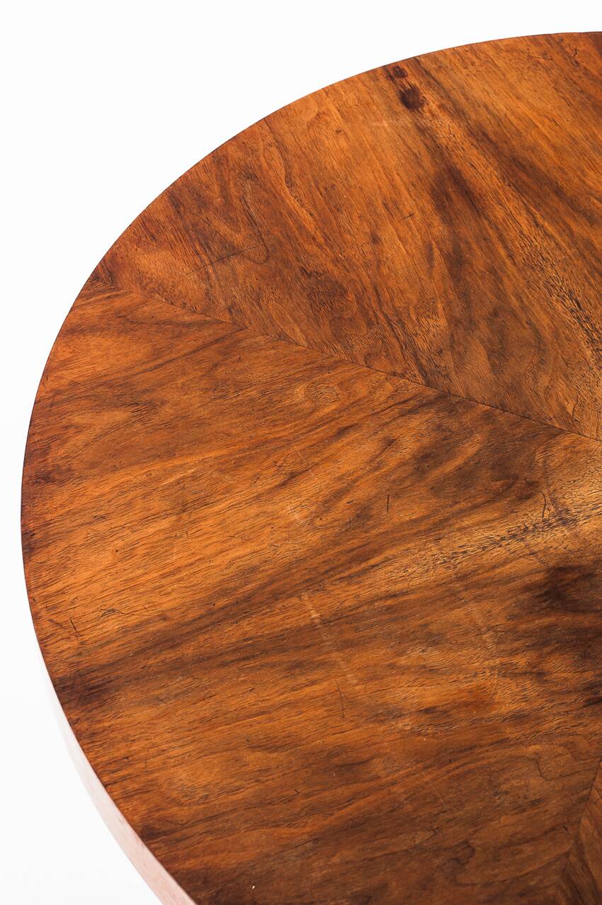 Art Deco style pedestal table in walnut wood veneer. France, 40's