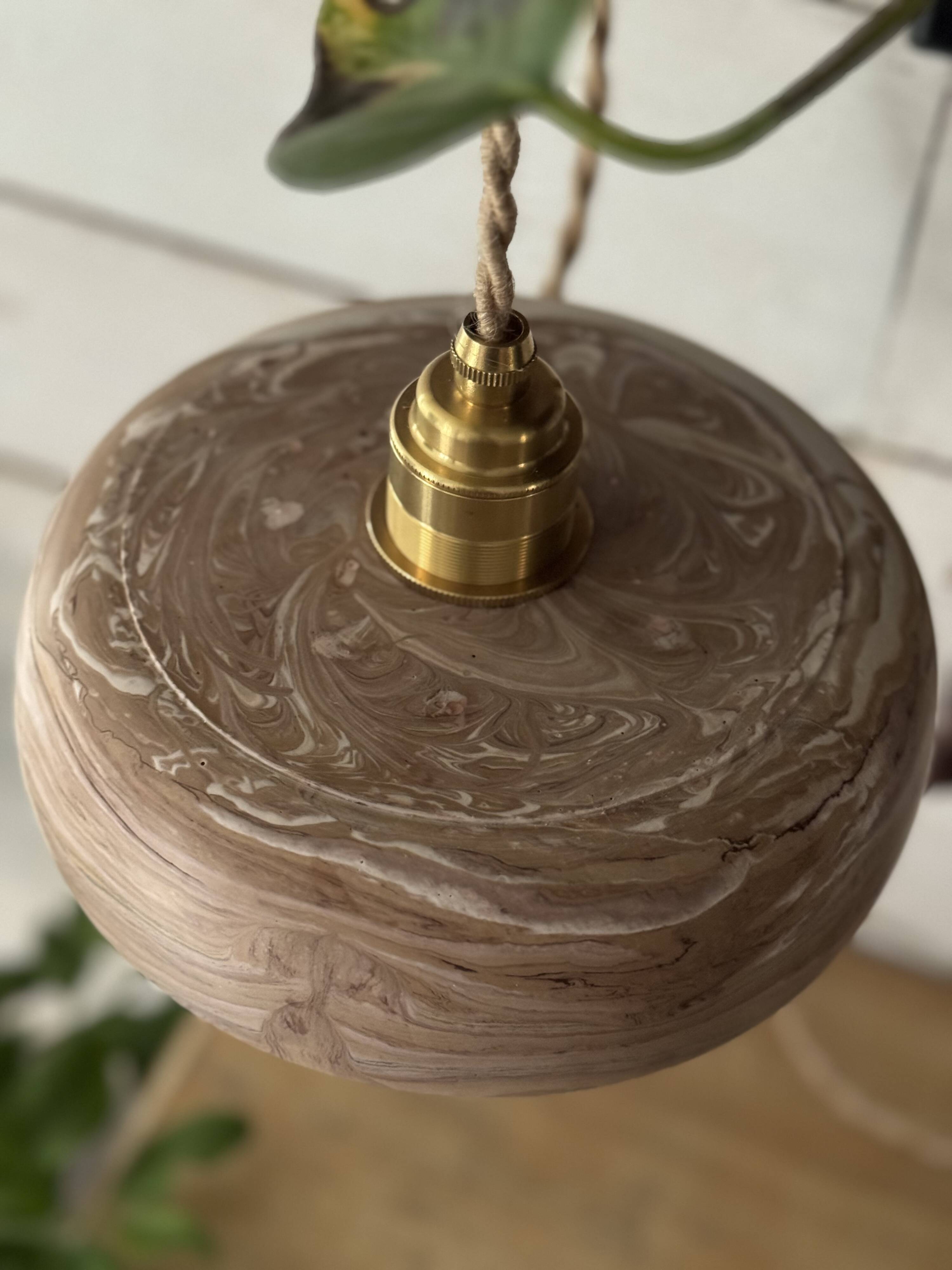Handcrafted portable lamp with a marbled stone effect