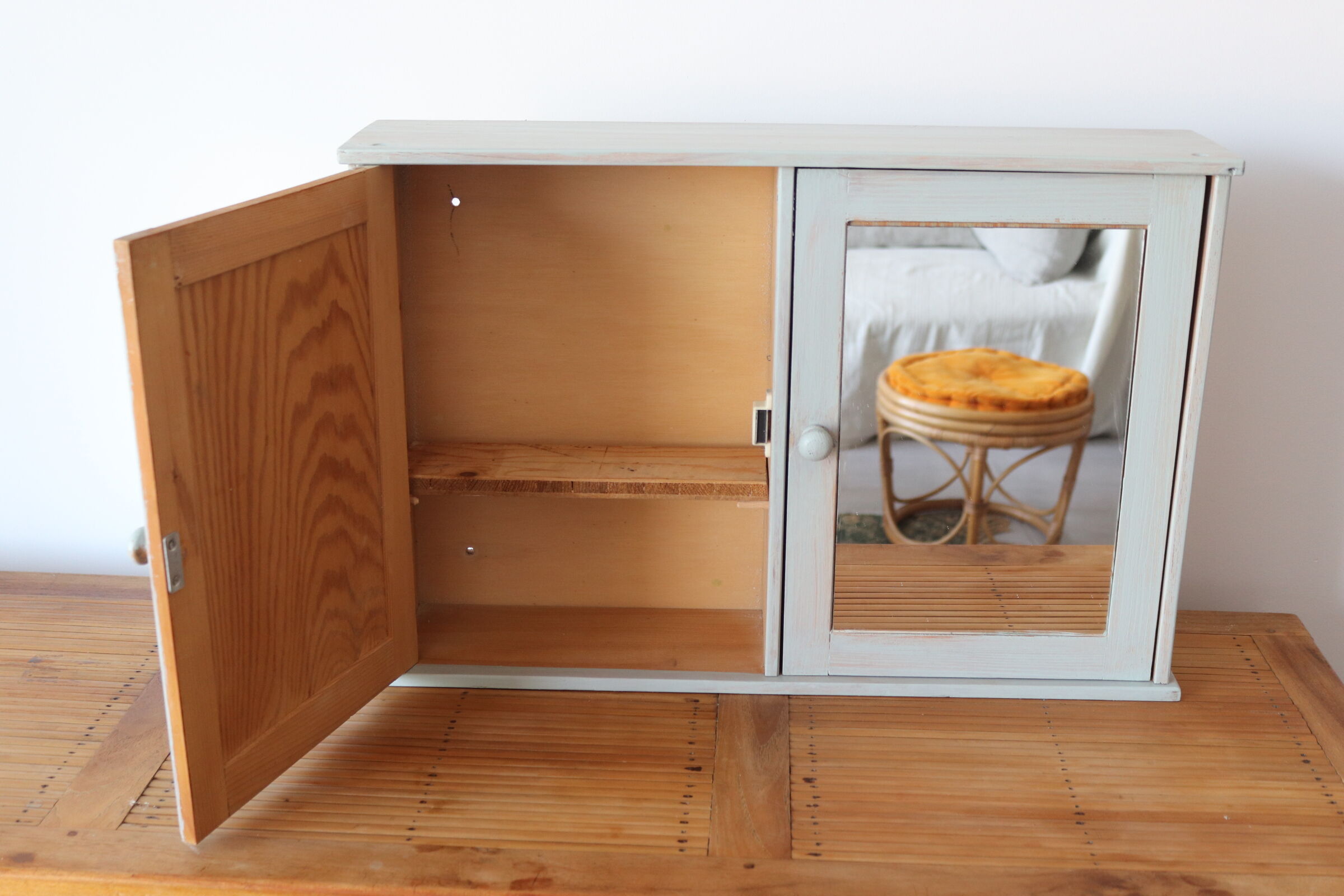 Greyed wood medicine cabinet