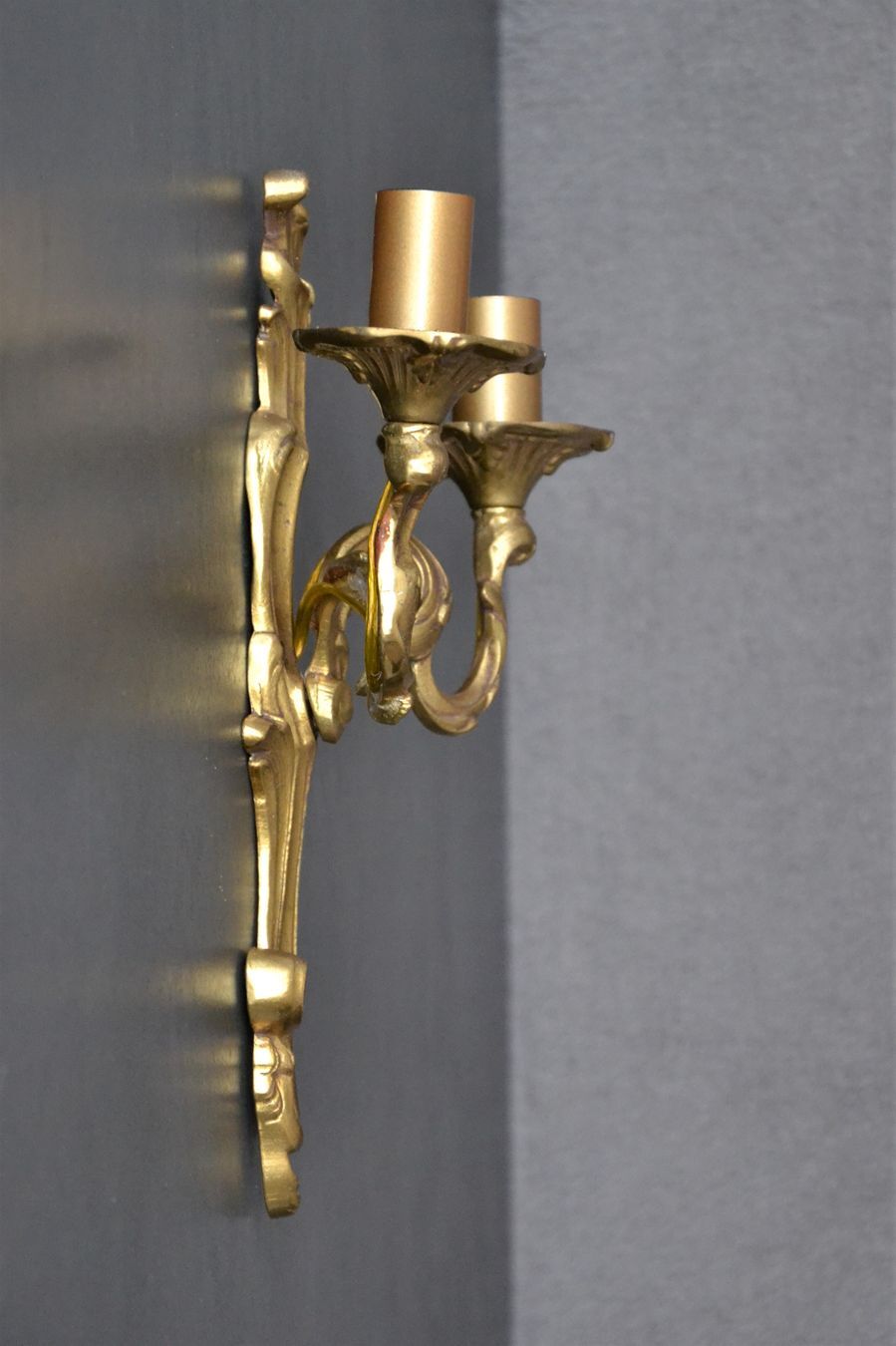 Wall lamp in twisted golden bronze baroque 2 lights