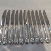 11 silver-plated dessert knives, Ercuis goldsmith, Roses model, Louis XVI style