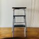 Tabouret escabeau vintage en formica noir et acier chromé