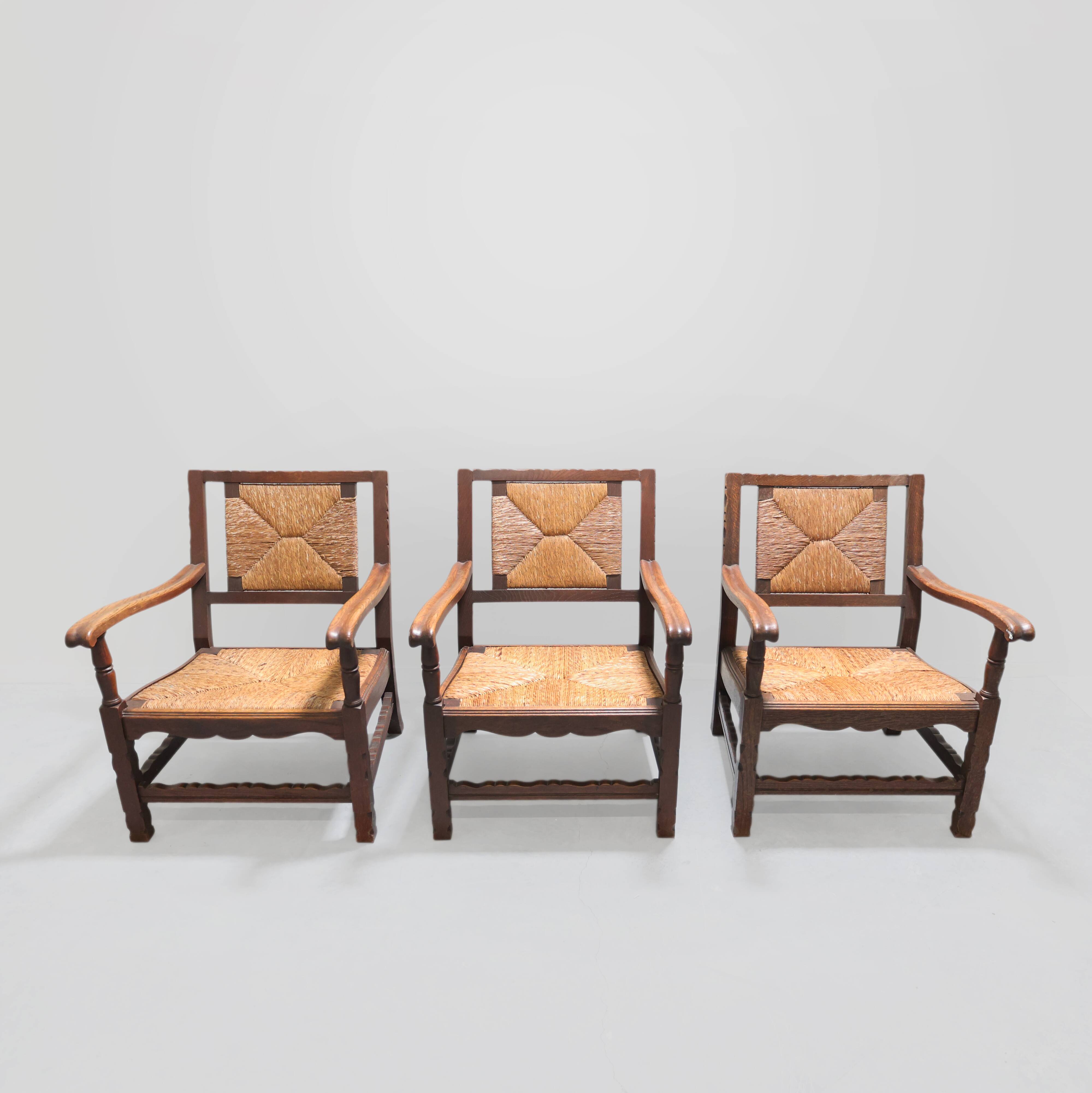 Mid-century rustic wooden armchairs with woven seat and back