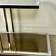 Belgo chrome serving cart/rolling table in chromed and gold-plated brass, 70s