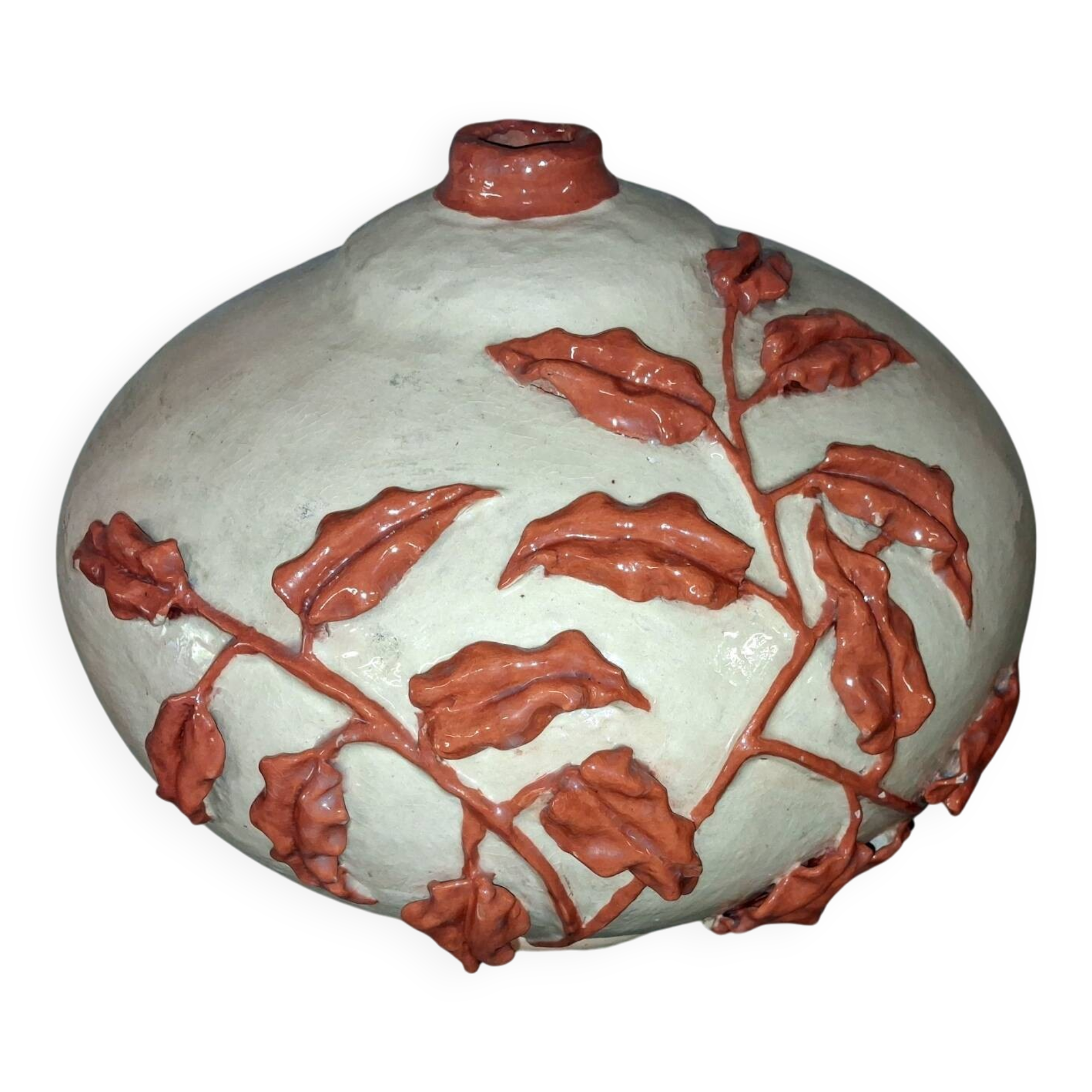 Large vase with relief plant decoration, raw art.