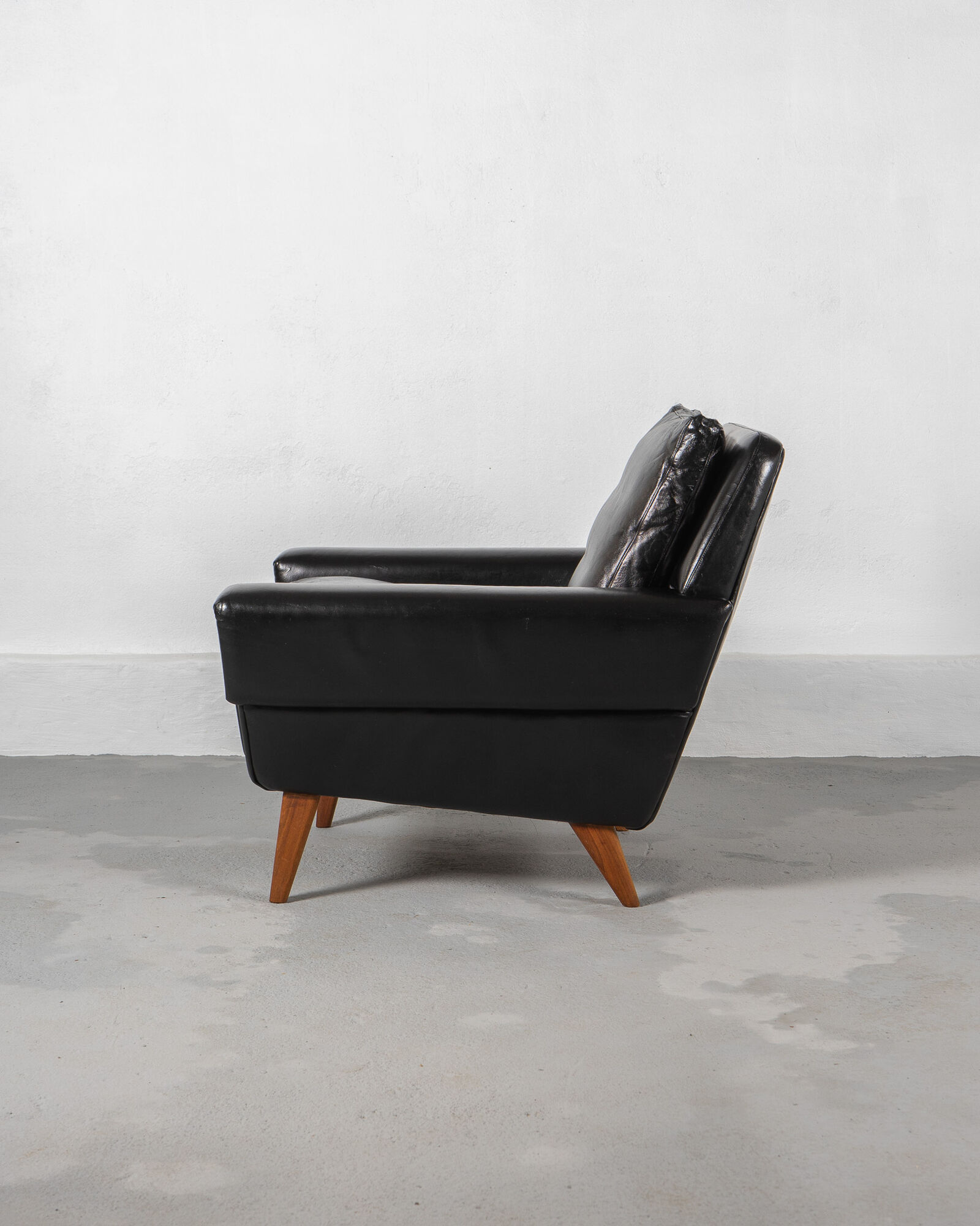 Mid Century Black Leather and Teak Scandinavian Armchair, Denmark, circa 1970