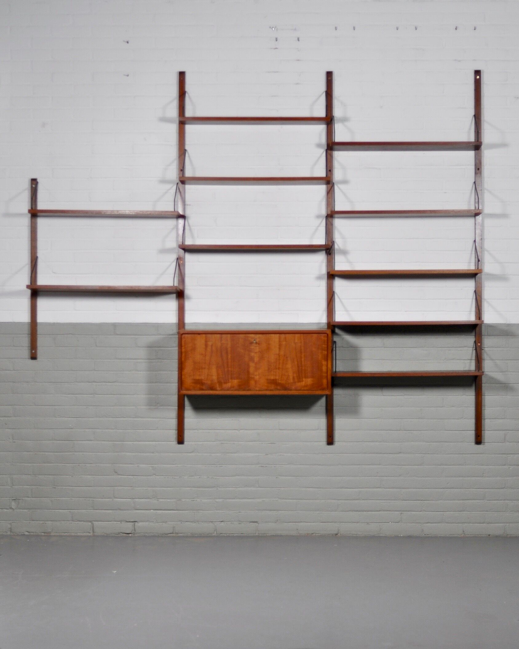 Danish Royal Wall System shelving unit by Poul Cadovius