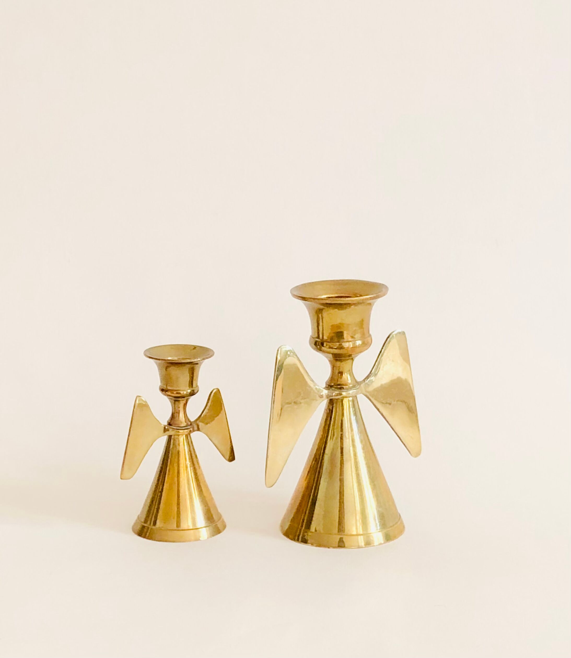 Duo of brass angel candle holders