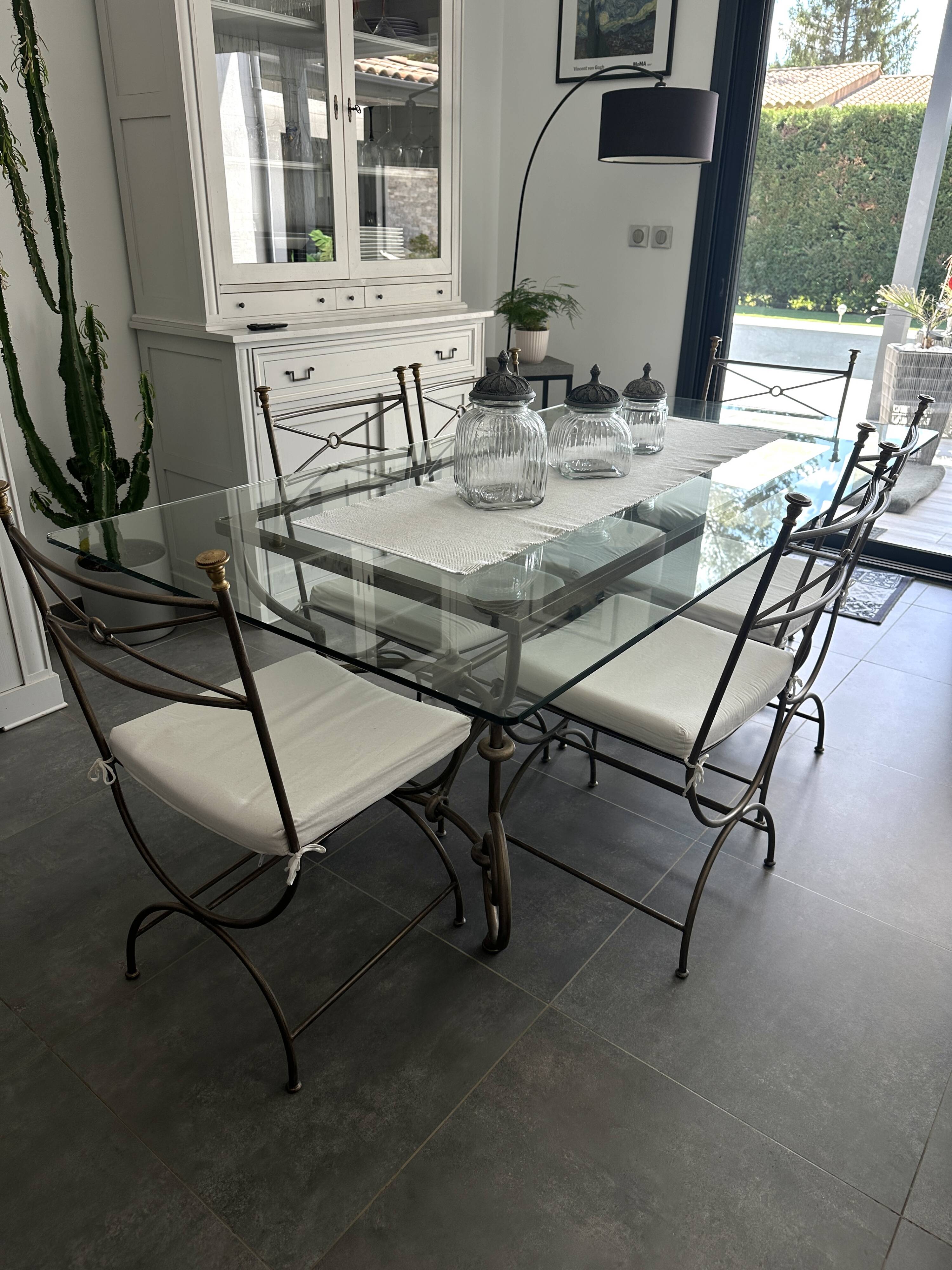 Roche Bobois glass and steel dining table and 6 chairs