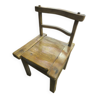 Chaise brutaliste teck massif vers 1960